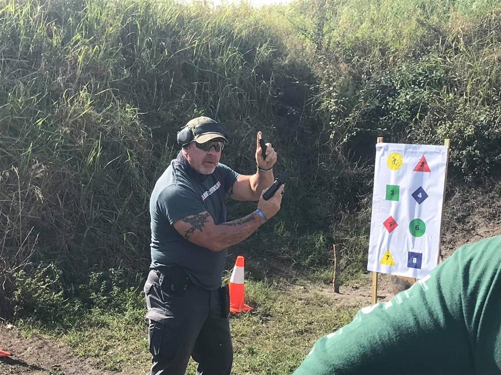 John P. Riddle instructing